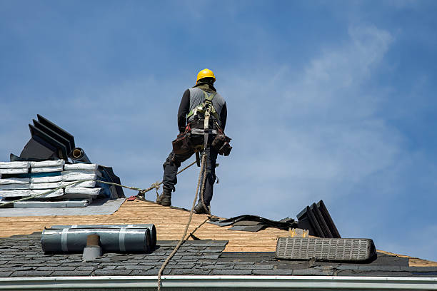 Professional Storm Damage Roof Repair technician working in Beverly, OH